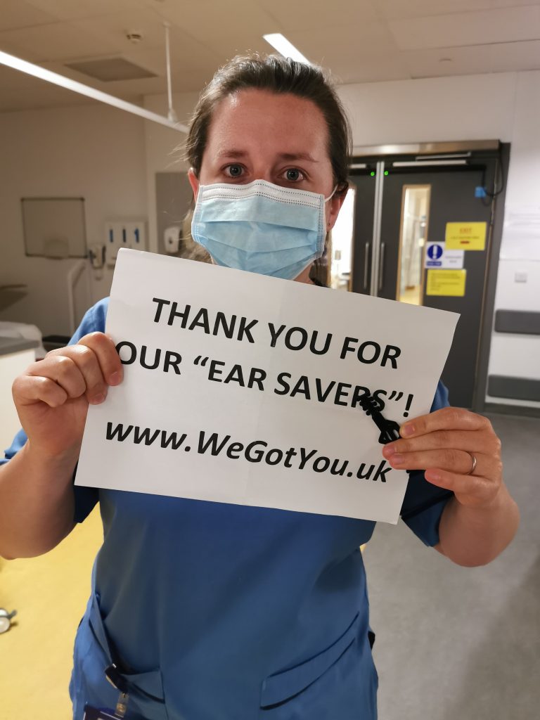 nhs fife employee with 3d printed ear saver donated by we got you
